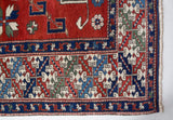 Vintage Turkish rug in a living room setting, pile rug, Turkish rug, vintage rug, portland, rug shop, bright colors, wild shaman, soft rug, bold color, Portland, Oregon, rug store, rug shop, local shop, antique rug
