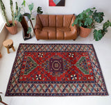 Vintage Turkish rug in a living room setting, pile rug, Turkish rug, vintage rug, portland, rug shop, bright colors, wild shaman, soft rug, bold color, Portland, Oregon, rug store, rug shop, local shop, antique rug