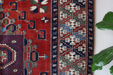 Vintage Turkish rug in a living room setting, pile rug, Turkish rug, vintage rug, portland, rug shop, bright colors, wild shaman, soft rug, bold color, Portland, Oregon, rug store, rug shop, local shop, antique rug