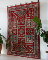 Vintage Turkish rug in a living room setting, pile rug, Turkish rug, vintage rug, portland, rug shop, bright colors, wild shaman, soft rug, bold color, Portland, Oregon, rug store, rug shop, local shop