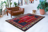Vintage Turkish rug in a living room setting, pile rug, Turkish rug, vintage rug, portland, rug shop, bright colors, wild shaman, soft rug, bold color, Portland, Oregon, rug store, rug shop, local shop