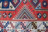 Vintage Turkish rug in living room setting, old rug, antique rug, pastel colors, faded colors, Turkish rug, vintage rug, soft rug, Portland, Oregon, rug store, rug shop, local shop