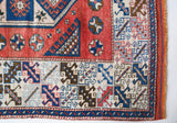 Vintage Turkish rug in living room setting, old rug, antique rug, pastel colors, faded colors, Turkish rug, vintage rug, soft rug, Portland, Oregon, rug store, rug shop, local shop