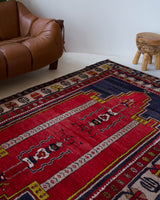 Vintage Turkish rug in a living room setting, pile rug, Turkish rug, vintage rug, portland, rug shop, bright colors, wild shaman, soft rug, bold color, Portland, Oregon, rug store, rug shop, local shop