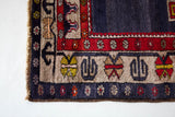 Vintage Turkish rug in a living room setting, pile rug, Turkish rug, vintage rug, portland, rug shop, bright colors, wild shaman, soft rug, bold color, Portland, Oregon, rug store, rug shop, local shop
