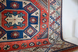 Vintage Turkish rug in living room setting, old rug, antique rug, pastel colors, faded colors, Turkish rug, vintage rug, soft rug, Portland, Oregon, rug store, rug shop, local shop