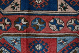 Vintage Turkish rug in living room setting, old rug, antique rug, pastel colors, faded colors, Turkish rug, vintage rug, soft rug, Portland, Oregon, rug store, rug shop, local shop