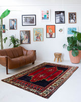 Vintage Turkish rug in a living room setting, pile rug, Turkish rug, vintage rug, portland, rug shop, bright colors, wild shaman, soft rug, bold color, Portland, Oregon, rug store, rug shop, local shop