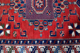 Vintage Turkish rug in a living room setting, pile rug, Turkish rug, vintage rug, portland, rug shop, bright colors, wild shaman, soft rug, bold color, Portland, Oregon, rug store, rug shop, local shop, antique rug