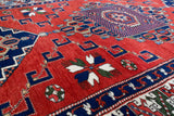 Vintage Turkish rug in a living room setting, pile rug, Turkish rug, vintage rug, portland, rug shop, bright colors, wild shaman, soft rug, bold color, Portland, Oregon, rug store, rug shop, local shop, antique rug