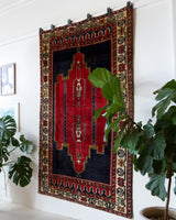 Vintage Turkish rug in a living room setting, pile rug, Turkish rug, vintage rug, portland, rug shop, bright colors, wild shaman, soft rug, bold color, Portland, Oregon, rug store, rug shop, local shop