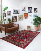 Vintage Turkish rug in a living room setting, pile rug, Turkish rug, vintage rug, portland, rug shop, bright colors, wild shaman, soft rug, bold color, Portland, Oregon, rug store, rug shop, local shop