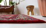 Vintage Turkish rug in a living room setting, pile rug, Turkish rug, vintage rug, portland, rug shop, bright colors, wild shaman, soft rug, bold color, Portland, Oregon, rug store, rug shop, local shop