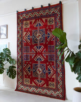 Vintage Turkish rug in a living room setting, pile rug, Turkish rug, vintage rug, portland, rug shop, bright colors, wild shaman, soft rug, bold color, Portland, Oregon, rug store, rug shop, local shop