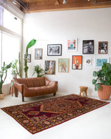 Vintage Turkish rug in a living room setting, pile rug, Turkish rug, vintage rug, portland, rug shop, bright colors, wild shaman, soft rug, bold color, Portland, Oregon, rug store, rug shop, local shop