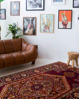 Vintage Turkish rug in a living room setting, pile rug, Turkish rug, vintage rug, portland, rug shop, bright colors, wild shaman, soft rug, bold color, Portland, Oregon, rug store, rug shop, local shop