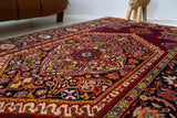 Vintage Turkish rug in a living room setting, pile rug, Turkish rug, vintage rug, portland, rug shop, bright colors, wild shaman, soft rug, bold color, Portland, Oregon, rug store, rug shop, local shop