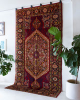 Vintage Turkish rug in a living room setting, pile rug, Turkish rug, vintage rug, portland, rug shop, bright colors, wild shaman, soft rug, bold color, Portland, Oregon, rug store, rug shop, local shop