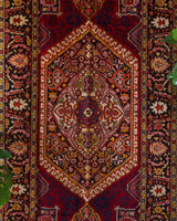 Vintage Turkish rug in a living room setting, pile rug, Turkish rug, vintage rug, portland, rug shop, bright colors, wild shaman, soft rug, bold color, Portland, Oregon, rug store, rug shop, local shop