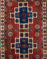 Vintage Turkish rug in a living room setting, pile rug, Turkish rug, vintage rug, portland, rug shop, bright colors, wild shaman, soft rug, bold color, Portland, Oregon, rug store, rug shop, local shop