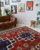 Vintage Turkish rug in a living room setting, pile rug, Turkish rug, vintage rug, portland, rug shop, bright colors, wild shaman, soft rug, bold color, Portland, Oregon, rug store, rug shop, local shop