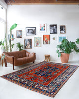 Vintage Turkish rug in a living room setting, pile rug, Turkish rug, vintage rug, portland, rug shop, bright colors, wild shaman, soft rug, bold color, Portland, Oregon, rug store, rug shop, local shop