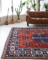 Vintage Turkish rug in a living room setting, pile rug, Turkish rug, vintage rug, portland, rug shop, bright colors, wild shaman, soft rug, bold color, Portland, Oregon, rug store, rug shop, local shop