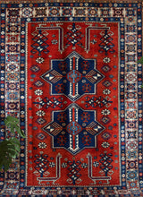 Vintage Turkish rug in a living room setting, pile rug, Turkish rug, vintage rug, portland, rug shop, bright colors, wild shaman, soft rug, bold color, Portland, Oregon, rug store, rug shop, local shop