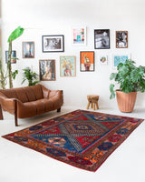 Vintage Turkish rug in a living room setting, pile rug, Turkish rug, vintage rug, portland, rug shop, bright colors, wild shaman, soft rug, bold color, Portland, Oregon, rug store, rug shop, local shop