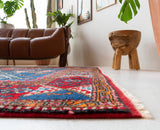 Vintage Turkish rug in a living room setting, pile rug, Turkish rug, vintage rug, portland, rug shop, bright colors, wild shaman, soft rug, bold color, Portland, Oregon, rug store, rug shop, local shop