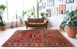 Vintage Turkish rug in a living room setting, pile rug, Turkish rug, vintage rug, portland, rug shop, bright colors, wild shaman, soft rug, bold color, Portland, Oregon, rug store, rug shop, local shop