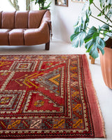 Vintage Turkish rug in a living room setting, pile rug, Turkish rug, vintage rug, portland, rug shop, bright colors, wild shaman, soft rug, bold color, Portland, Oregon, rug store, rug shop, local shop