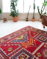 Vintage Turkish rug in a living room setting, pile rug, Turkish rug, vintage rug, portland, rug shop, bright colors, wild shaman, soft rug, bold color, Portland, Oregon, rug store, rug shop, local shop