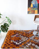 Vintage Turkish runner rug in living room setting, old rug, antique rug, pastel colors, faded colors, Turkish rug, vintage rug, soft rug, Portland, Oregon, rug store, rug shop, local shop