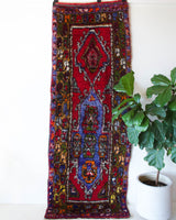 Vintage Turkish runner rug in living room setting, old rug, antique rug, pastel colors, faded colors, Turkish rug, vintage rug, soft rug, Portland, Oregon, rug store, rug shop, local shop