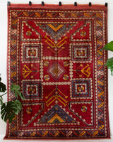 Vintage Turkish rug in a living room setting, pile rug, Turkish rug, vintage rug, portland, rug shop, bright colors, wild shaman, soft rug, bold color, Portland, Oregon, rug store, rug shop, local shop