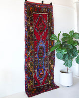 Vintage Turkish runner rug in living room setting, old rug, antique rug, pastel colors, faded colors, Turkish rug, vintage rug, soft rug, Portland, Oregon, rug store, rug shop, local shop