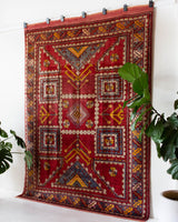 Vintage Turkish rug in a living room setting, pile rug, Turkish rug, vintage rug, portland, rug shop, bright colors, wild shaman, soft rug, bold color, Portland, Oregon, rug store, rug shop, local shop