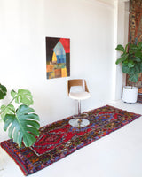 Vintage Turkish runner rug in living room setting, old rug, antique rug, pastel colors, faded colors, Turkish rug, vintage rug, soft rug, Portland, Oregon, rug store, rug shop, local shop