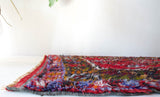 Vintage Turkish runner rug in living room setting, old rug, antique rug, pastel colors, faded colors, Turkish rug, vintage rug, soft rug, Portland, Oregon, rug store, rug shop, local shop