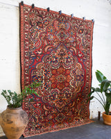 old rug, antique rug, Turkish rug, Portland, Oregon, rug store, rug shop, local shop, bright colors, wild shaman, large rug, area rug, red rug, bold color, burgundy, dark red, persian rug