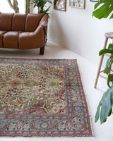 Vintage Turkish rug in living room setting, old rug, antique rug, pastel colors, faded colors, Turkish rug, vintage rug, soft rug, Portland, Oregon, rug store, rug shop, local shop
