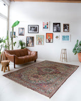 Vintage Turkish rug in living room setting, old rug, antique rug, pastel colors, faded colors, Turkish rug, vintage rug, soft rug, Portland, Oregon, rug store, rug shop, local shop