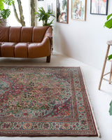 Vintage Turkish rug in living room setting, old rug, antique rug, pastel colors, faded colors, Turkish rug, vintage rug, soft rug, Portland, Oregon, rug store, rug shop, local shop