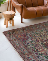 Vintage Turkish rug in living room setting, old rug, antique rug, pastel colors, faded colors, Turkish rug, vintage rug, soft rug, Portland, Oregon, rug store, rug shop, local shop