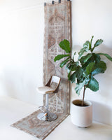 Vintage Turkish runner rug in living room setting, old rug, antique rug, pastel colors, faded colors, Turkish rug, vintage rug, soft rug, Portland, Oregon, rug store, rug shop, local shop