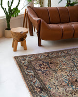 Vintage Turkish rug in living room setting, old rug, antique rug, pastel colors, faded colors, Turkish rug, vintage rug, soft rug, Portland, Oregon, rug store, rug shop, local shop