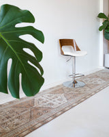 Vintage Turkish runner rug in living room setting, old rug, antique rug, pastel colors, faded colors, Turkish rug, vintage rug, soft rug, Portland, Oregon, rug store, rug shop, local shop