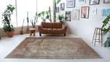Vintage Turkish rug in living room setting, old rug, antique rug, pastel colors, faded colors, Turkish rug, vintage rug, soft rug, Portland, Oregon, rug store, rug shop, local shop