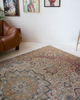 Vintage Turkish rug in living room setting, old rug, antique rug, pastel colors, faded colors, Turkish rug, vintage rug, soft rug, Portland, Oregon, rug store, rug shop, local shop